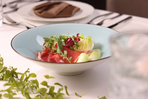 Prosciutto di melon with pickled melon & rocket lettuce salad