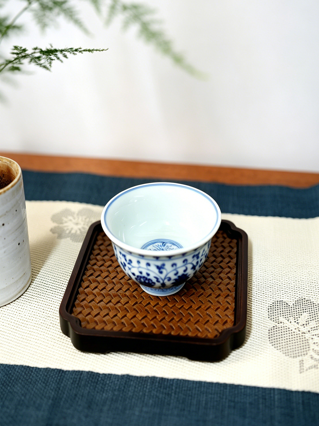 (Reproduction) Ming Dynasty, Yongle Period · Underglaze Blue "Hand-Gripping" Cup with Interlocking Lotus Pattern